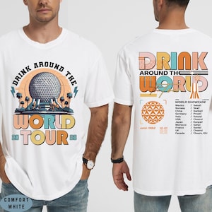 May include: White t-shirts with a colorful "Drink Around The World" graphic. The front design features a globe and the words "World Tour 26". The back design includes a list of countries and their respective cheers.