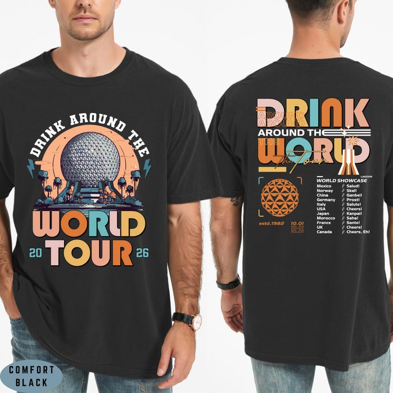 May include: Black t-shirt with a colorful graphic design. The front features the text "DRINK AROUND THE WORLD TOUR 2026" with a stylized image of a geodesic sphere. The back has "DRINK AROUND THE WORLD" and a list of countries.