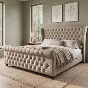 May include: A beige upholstered bed frame featuring a high, tufted wingback headboard and a matching tufted scroll footboard. The bed is dressed with neutral-toned bedding, including pillows and a textured throw blanket, showcasing a button-tufted design.