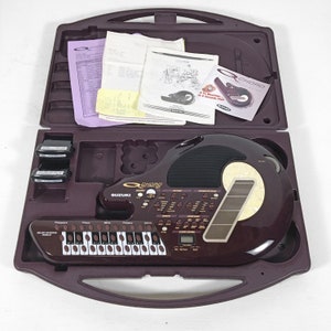Suzuki Q Chord Omnichord QC-1 With Case, Cartridges, and Paperwork 