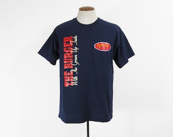 Vintage 90er Jahre Donuts Done T-Shirt Arch Deluxe Burger Promo Navy Blau T-Shirt - Size Large