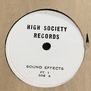 May include: A white record label with the text "HIGH SOCIETY RECORDS" and "SOUND EFFECTS PT. 1 508 A" in black. The label is set against a tan background, suggesting a vintage or retro aesthetic. The label has a black center hole.