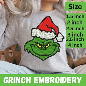 May include: A gray sweatshirt featuring a green Grinch face with a red Santa hat and the text "GRINCH EMBROIDERY". The size options range from 1.5 inches to 4 inches.