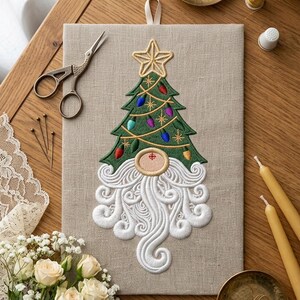 May include: A rectangular beige linen fabric panel featuring an embroidered design of a gnome with a long white swirling beard and a green Christmas tree hat topped with a gold star and decorated with colorful lights and gold star accents.