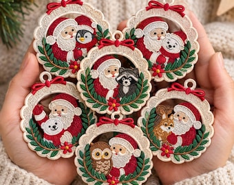 May include: A collection of five circular embroidered Christmas ornaments featuring Santa Claus with various animals including a penguin, polar bear, raccoon, squirrel, and owl. Each ornament has a scalloped beige border and a red ribbon.