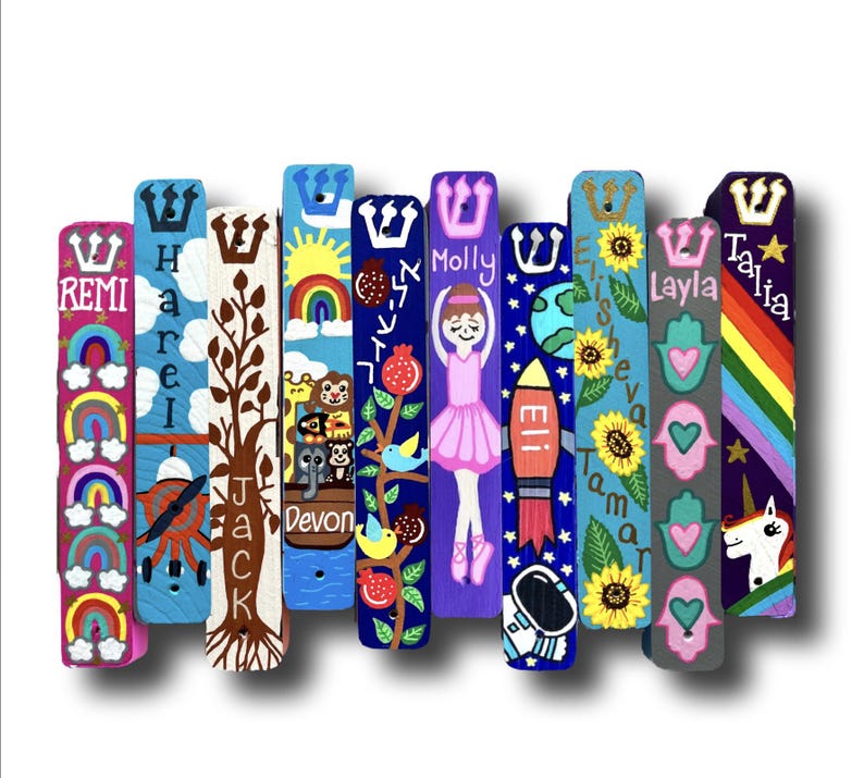 A collection of colorful and uniquely decorated bookends, each featuring a different design or character.
