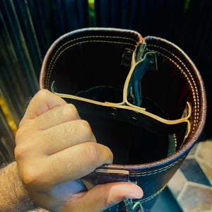 Top-down shot of the Personalized Vintage Cowhide Leather Golf Bag revealing wool-lined club dividers.