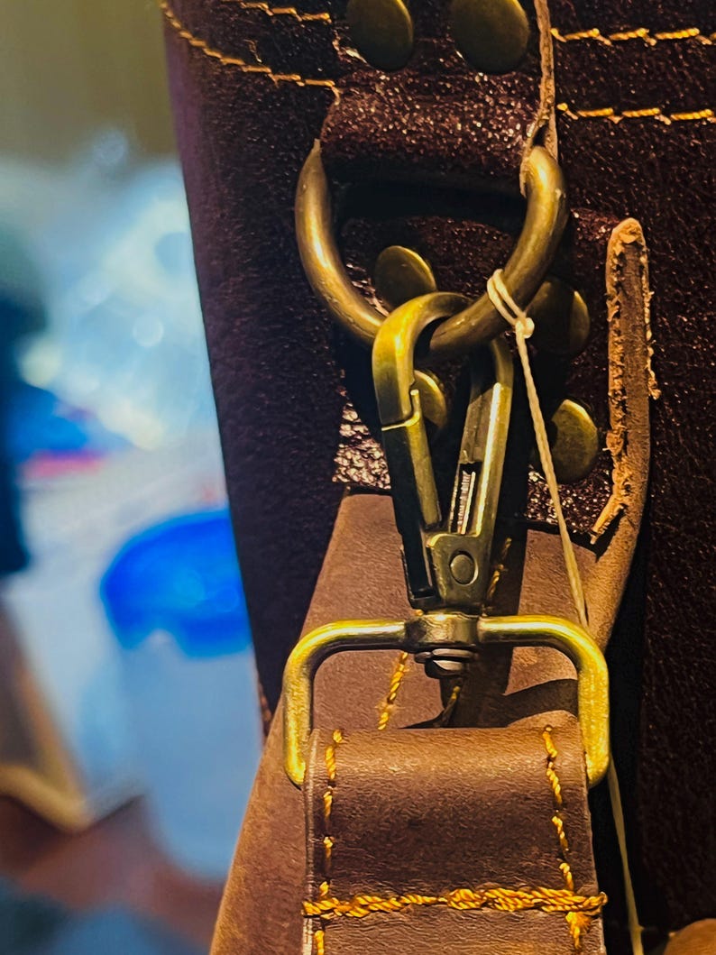 Close-up of the monogram-ready front pocket on the Personalized Vintage Cowhide Leather Golf Bag.