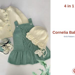 May include: A four-piece baby set featuring a cream-coloured cardigan with floral accents, a seafoam green dress, a matching hat, and baby shoes. The set is handmade and includes the text "Cornelia Baby Set".