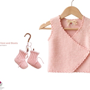 May include: A light pink knitted baby vest and matching booties. The vest has a wrap-style front and scalloped edges, hanging on a wooden hanger. The booties are suspended from a hook. The text "Hunza Baby Vest and Boots" is visible.