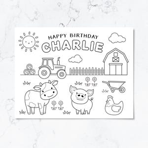 May include: A black and white colouring page featuring a farm theme with the text HAPPY BIRTHDAY CHARLIE. The design includes a smiling sun, a tractor, a barn, a fence, a cow, a pig, a chicken, a wheelbarrow, clouds, and small flowers.