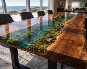 May include: A rectangular dining table featuring a live edge wood slab with a central river design made of clear blue resin. The resin section contains embedded green moss, small brown pinecones, and smooth pebbles, supported by black metal legs.