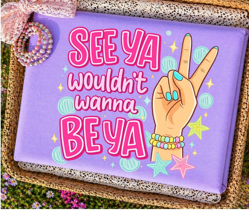 May include: A lavender pillow with the text "SEE YA wouldn't wanna BE YA" in pink. A hand with a peace sign is illustrated on the right. The hand has blue fingernails and is wearing bracelets. Stars and circles decorate the pillow.
