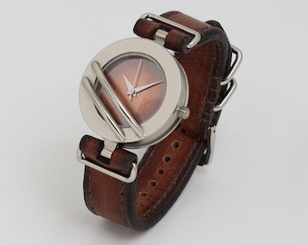 Reloj Voyager artesanal, alpaca con correa de cuero