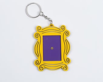 Llavero icónico de Friends: marco amarillo con centro morado