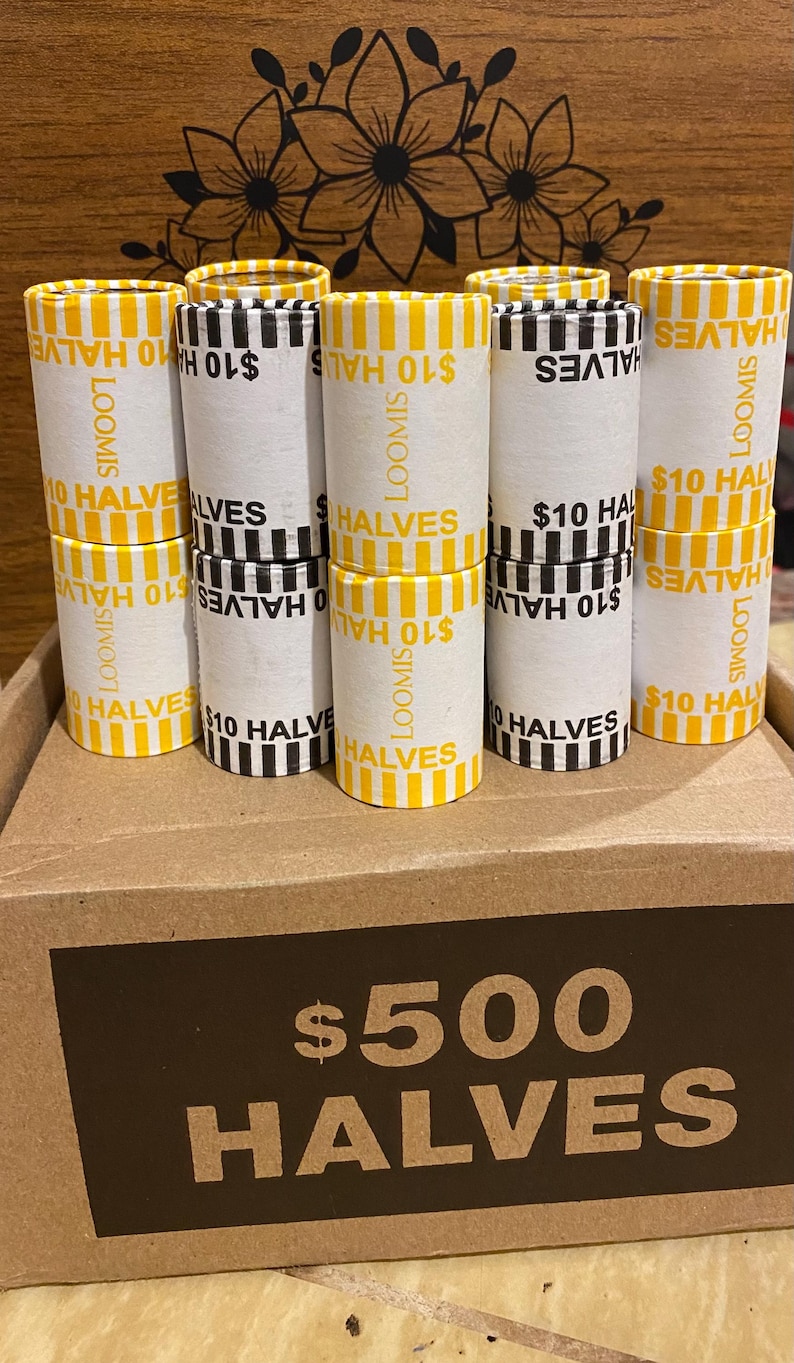 May include: A box of $500 in half dollars, with rolls of coins labeled "$10 Halves" and "Loomis". The rolls are white with yellow and black stripes. The box has the text "$500 Halves".