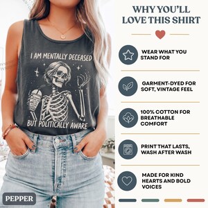 May include: A dark gray sleeveless tank top featuring a white graphic of a skeleton holding a drink with the text I AM MENTALLY DECEASED BUT POLITICALLY AWARE. The right side displays a list of product features including garment-dyed fabric, 100% cotton material, and long-lasting print quality.