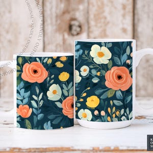May include: Two white ceramic mugs featuring a dark navy blue background with a repeating floral pattern of peach, yellow, and cream-colored flowers, along with green and blue leaves. The mugs have a white handle and a white interior rim.