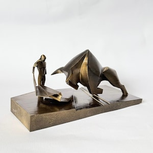 May include: A white ceramic mug with a black handle and the text "But First, Coffee" in a bold, black font. The mug is suitable for hot drinks. The mug likely holds between 310-425 ml.