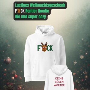Könnte beinhalten: Weißer Hoodie mit einem Rentier-Grafik und dem Text "F*CK" in Grün. Auf der Rückseite des Hoodies steht der Text "KEINE BÖSEN WÖRTER" in Rot. Das Bild enthält auch Text auf Deutsch.