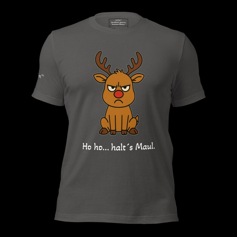 K&ouml;nnte beinhalten: Dunkelgraues T-Shirt mit einem Cartoon-Rentier mit w&uuml;tendem Gesicht und roter Nase. Das Rentier hat braunes Geweih und sitzt. Der Text "Ho ho... halt's Maul." ist unter dem Rentier aufgedruckt.