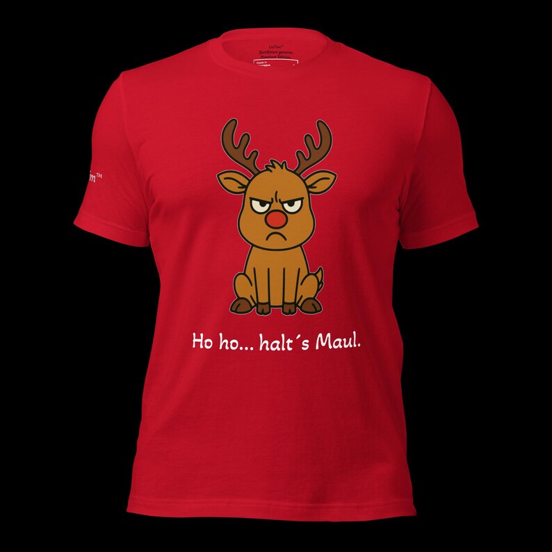 K&ouml;nnte beinhalten: Rotes T-Shirt mit einem Cartoon-Rentier mit w&uuml;tendem Gesicht und roter Nase. Das Rentier hat braunes Geweih und sitzt. Der Text "Ho ho... halt's Maul." ist unter dem Rentier aufgedruckt.