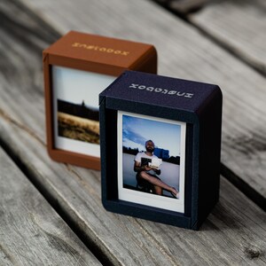 Instabox: Dubbelsidig Instax-ram med dold fotoförvaring
