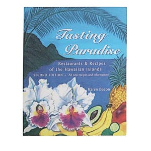 May include: A book cover titled "Tasting Paradise" with text about Hawaiian restaurants and recipes. The cover features a blue background with palm fronds, a mountain silhouette, and illustrations of orchids, pineapple, bananas, and other tropical fruits.