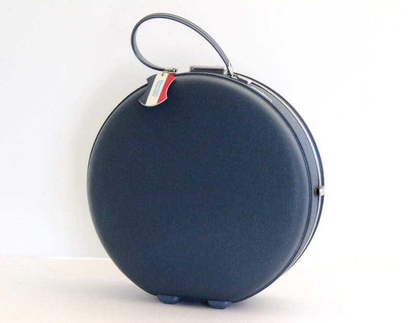 american tourister round suitcase