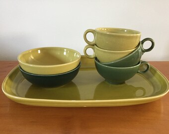 Pair of dark green Universal Pottery "Ballerina" cups