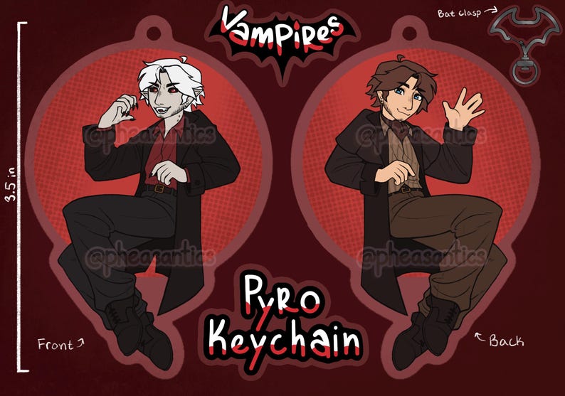 May include: A red and black Pyro Keychain featuring two cartoon vampire characters. The front shows a vampire with white hair and the back shows a vampire with brown hair. The keychain is 8.89 cm in height.