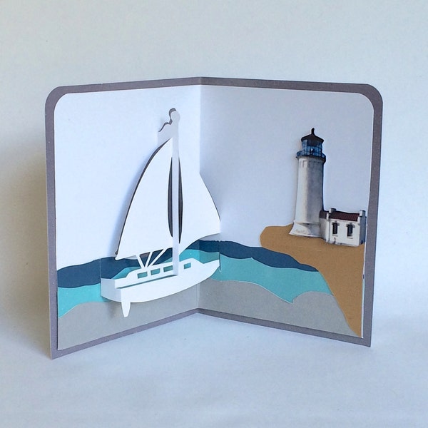 SAILBOAT and LIGHTHOUSE NAUTICAL Pop-Up 3D Card. Home Décor Handmade in White, Dark Blue, Turquoise, Silver and Gold on Shimmery Purple OOaK