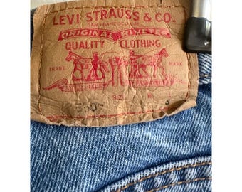 Levis 550 Classic Relaxed Fit Jeans Womens 4 Medium Wash High Rise Tapered Leg
