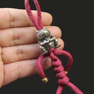 Perlina in ottone per paracord, perlina a forma di rana egiziana per uso quotidiano, perlina per cordino da coltello, ciondolo a forma di animale per portachiavi, accessorio fai da te per paracord