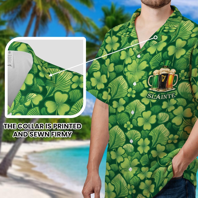 May include: Green button-up shirt with a shamrock and leaf pattern. The shirt features a graphic of three beer mugs with the word "SL&Aacute;INTE". The collar is printed and sewn firmly.