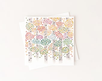 May include: A square greeting card featuring a watercolor illustration of a forest of birch trees. The tree canopies are composed of numerous small, multicolored hearts in shades of pink, yellow, green, blue, and orange against white.