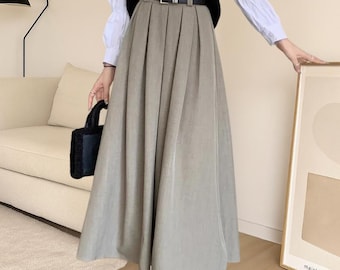 Women’s Korean-Style Solid Color Midi Pleated Skirt – Versatile A-Line Long Swing Skirt