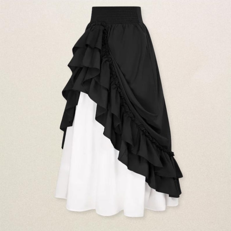 May include: A two-tone skirt featuring a black ruffled overlay and a white underskirt. The skirt has a high, elasticized waistband and a layered, asymmetrical design. The black fabric drapes elegantly, creating a flowing silhouette.