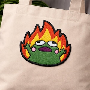 Funny Burning Frog Embroidered Patch | Chaotic Meme Iron On Applique | Cute Fire Frog Badge for Jackets Backpacks | Derpy Animal
