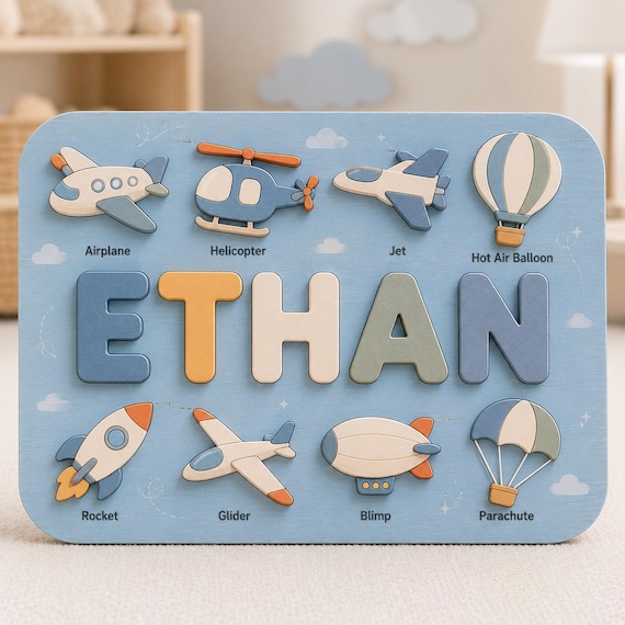 A name puzzle shaped as an entire airplane and aviation scene — hyper-specific enough that any future pilot's kid or aviation-family toddler becomes obsessed.