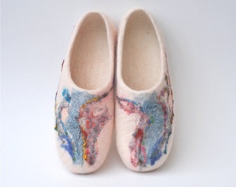 Felted slippers from natural white wool, shiny