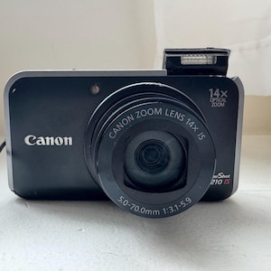 Cámara digital Canon PowerShot SX210 IS – Cámara compacta de 14 MP con zoom 14x – Cámara de bolsillo para viajes – Digicam vintage. Fabricada en Japón.