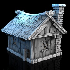 May include: A miniature wooden house with a light blue shingled roof and a brick chimney. The walls are made of vertical wooden planks, and the windows are small and barred. The house has a rustic, handcrafted appearance.