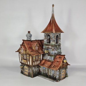 May include: A detailed miniature model of a medieval-style building. The structure features a tall tower with a pointed roof, a brick facade, and multiple levels with windows and doors. The roof is red, and the walls are a mix of stone and wood.