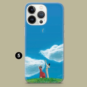 May include: A blue iPhone case featuring an illustration of a couple on a grassy hill, reaching towards a bird in a bright blue sky with fluffy white clouds. The woman wears a red dress.