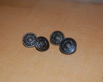 4 brass colored buttons that sew on but look set in  #0188
