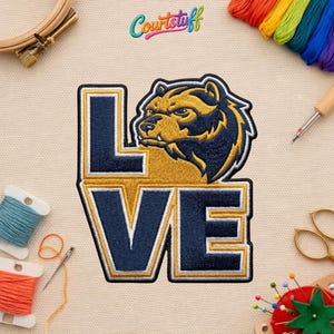May include: Embroidered patch featuring the word "LOVE" with a bear head replacing the "O". The bear is navy blue and gold, with a white outline. The patch is on a beige fabric background. The brand name "Courtstuff" is in the top left corner.