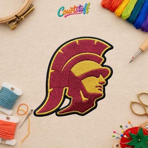 May include: A white ceramic mug with a black handle and the text "But First, Coffee" in a handwritten style. The mug is on a white surface. The mug is approximately 4 inches tall.