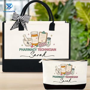 May include: A white tote bag and matching cosmetic bag with a black base and handles. Both bags feature a pharmacy technician design with a mortar and pestle, prescription bottle, and the name "Sarah". A black and white striped bow adorns the tote bag.
