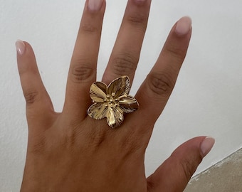 adjustable flower ring. stainless steel